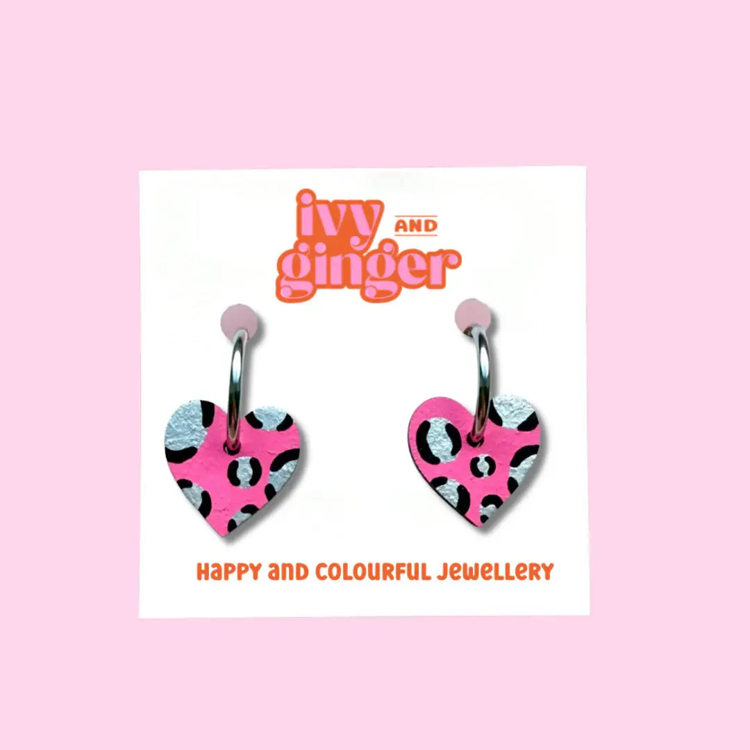 Bright pink and silver leopard print heart hoop earrings