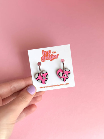 Bright pink and silver leopard print heart hoop earrings